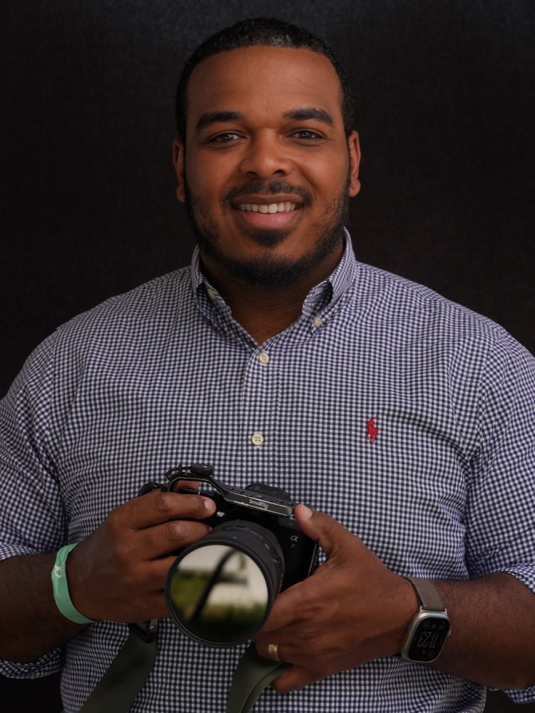 Stew holding a rigged Sony a7